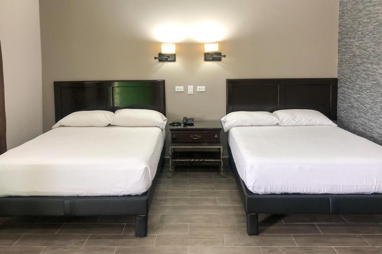 Capital O Palms Hotel, Acuna Ciudad Acuna Ngoại thất bức ảnh